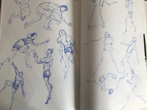 A sketchbook spread of gesture drawings
